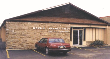 herald and banner about us picture our history locations and building pictures